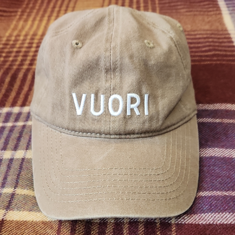 Vuori khaki tan baseball cap with white logo